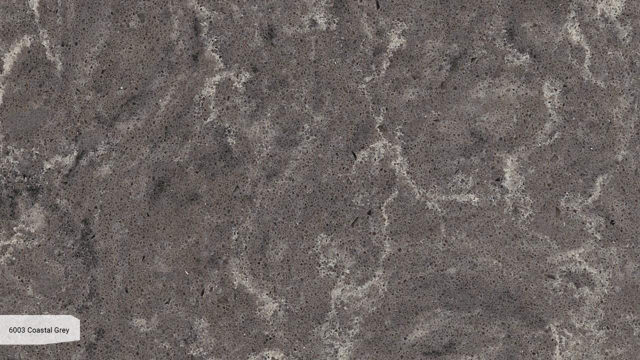 Szary Konglomerat Caesarstone na blaty kuchenne, parapety i schody. Caesarstone gwarancja